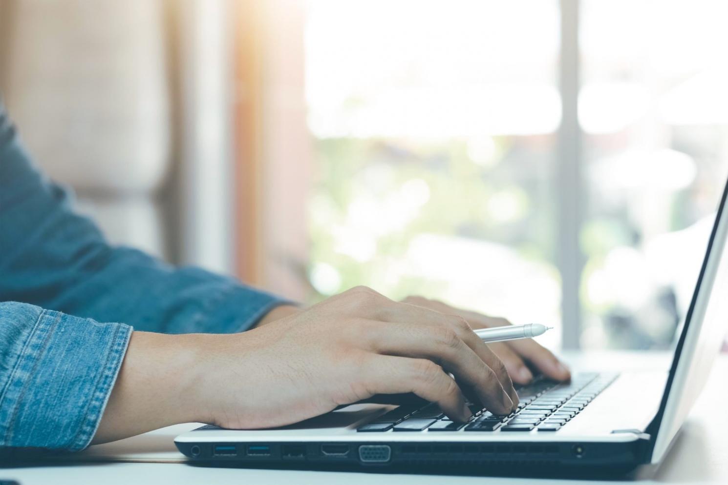 Student working on virtualization configuration remotely